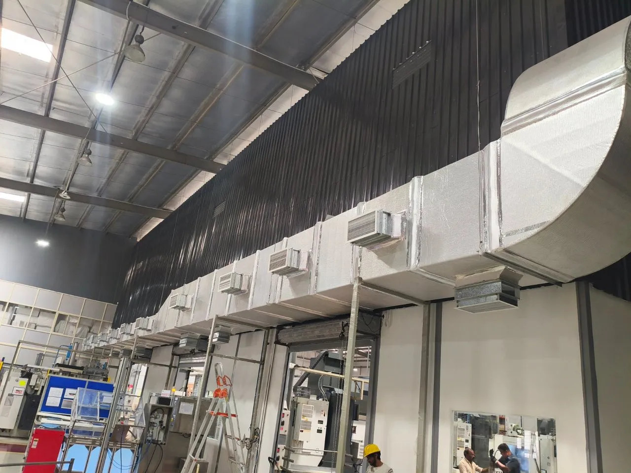 Overhead Insulated Fresh Air Trunk Across CNC Machining Line